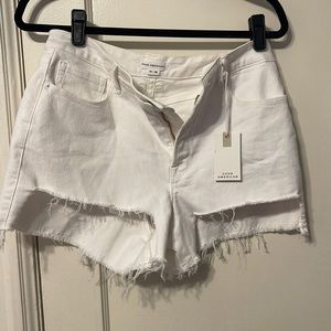 Good American cut off white shorts